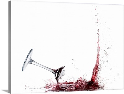 Falling glass of red wine