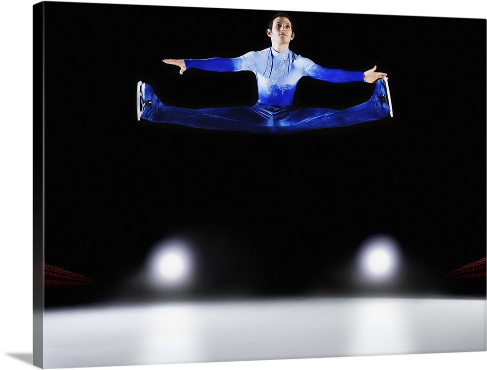 Male figure skater performing Russian Split.