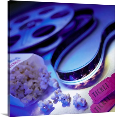 Film reel with popcorn and tickets