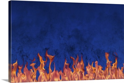 Fire against a blue background with smoke
