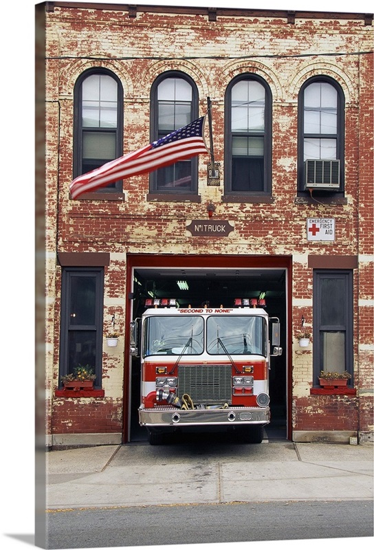 Fire engine parked in a small town firehouse | Great Big Canvas