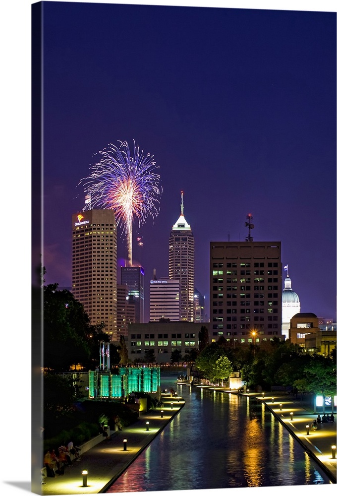 Downtown Indianapolis with fireworks show in looking down west canal.