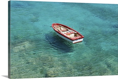 Fishing boat in clear, colorful water, Mani region on Peloponnese