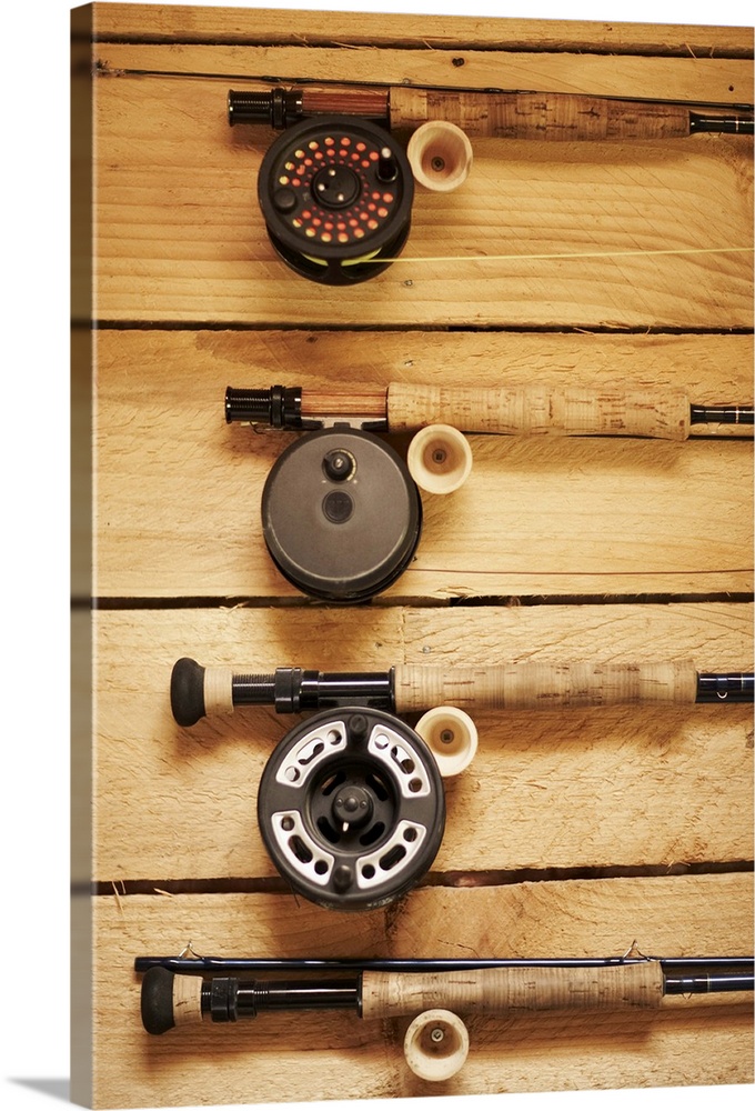 Fly fishing reels hanging on wall Wall Art, Canvas Prints, Framed