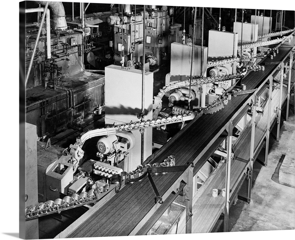 Machining of aluminum pistons at the Ford Motor Company's Cleveland Engine Plant requires 25 machines so tied together by ...