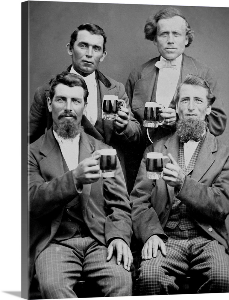 Four buddies get together and toast themselves with beer for a tintype portrait.