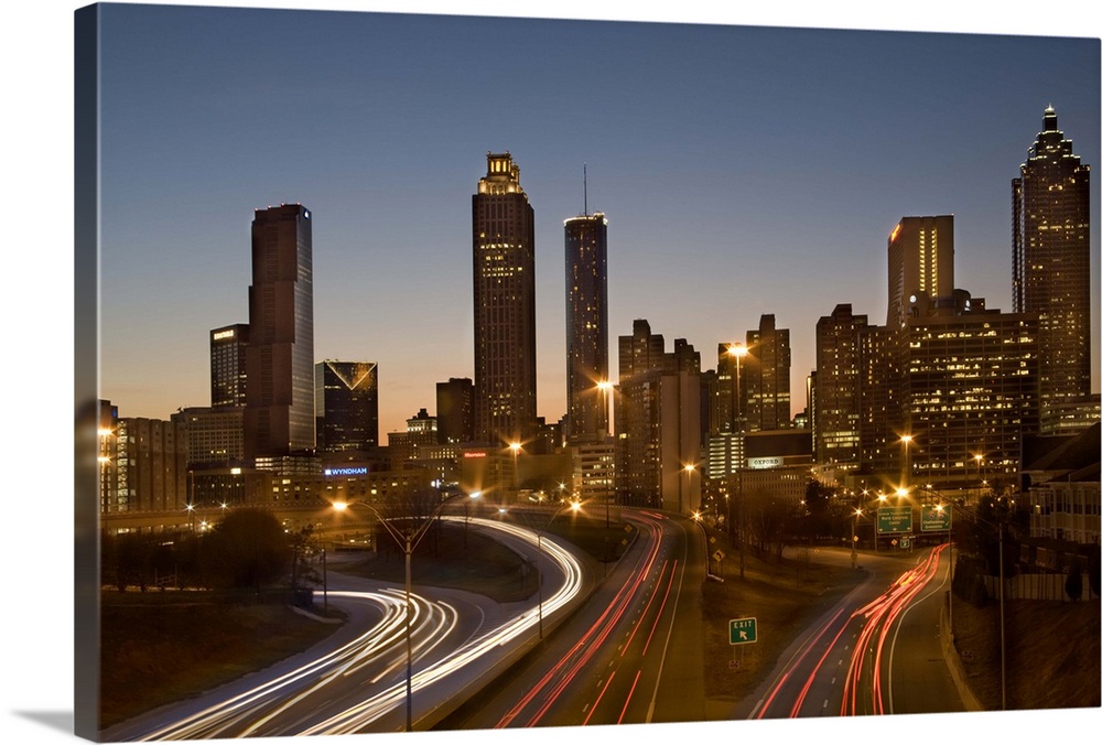 USA, Georgia, Atlanta, traffic on highways leading towards downtown city at dusk, long exposure