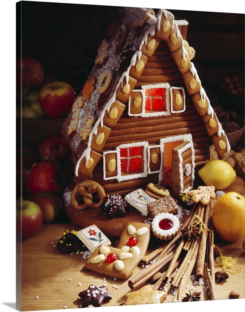 Gingerbread house with interior lighting Wall Art, Canvas Prints