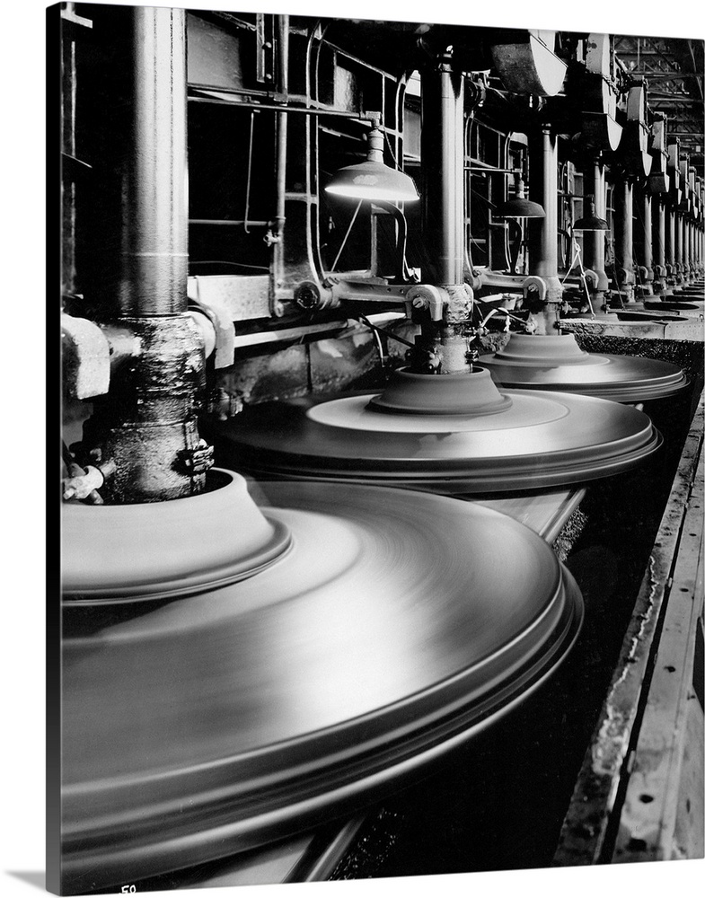 Creighton, PA- Scene in Pittsburgh plate glass plant, showing the grinding and polishing of large plates of glass. Undated...