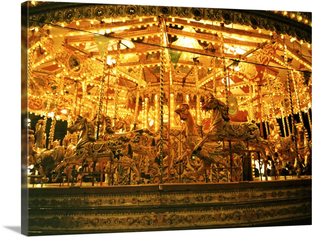 Beautiful old fashioned carousel in golden light.