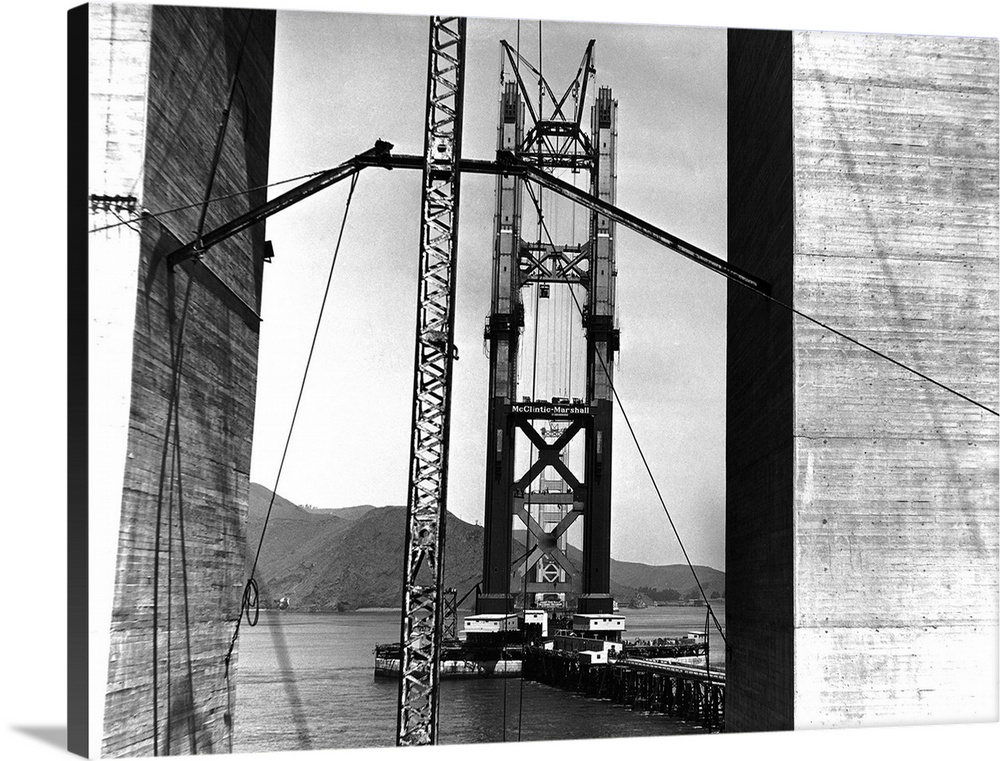 Photo shows the Golden Gate Bridge in San Francisco under construction.