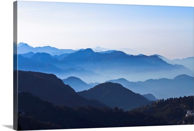 Good layers of Mountains with clear blue sky, slight mist on mountains, India