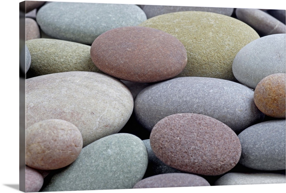 Granite pebbles on beach, full frame