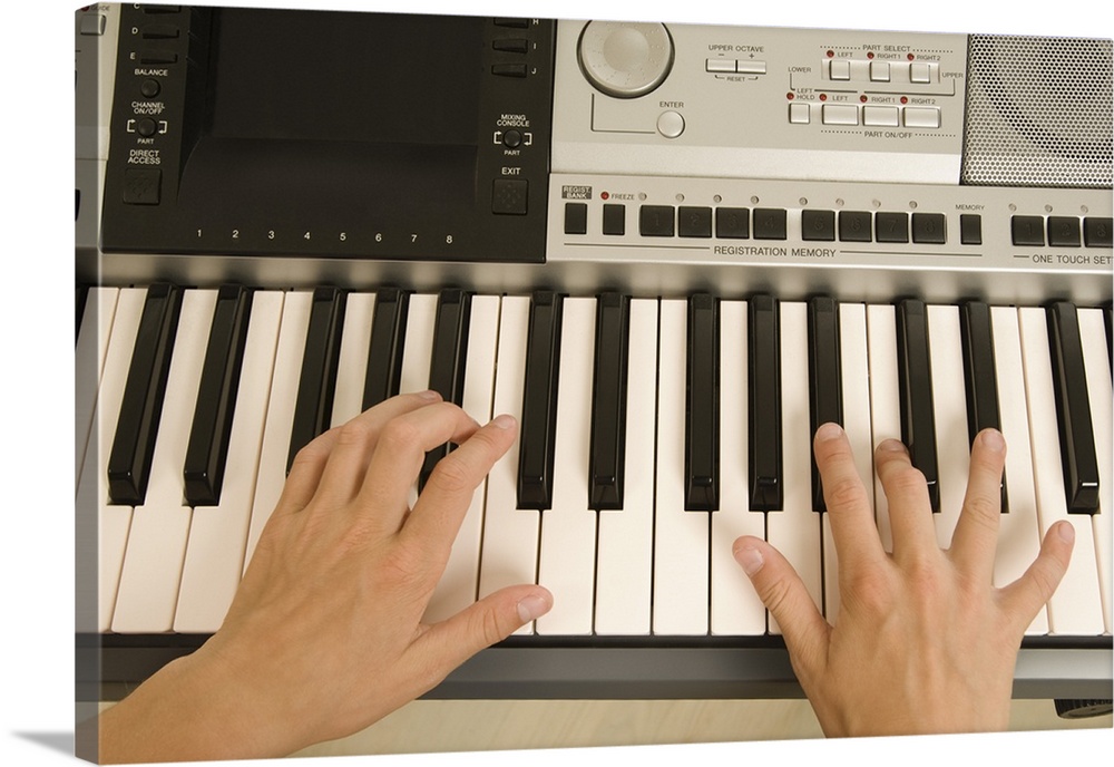 Hands playing keyboard