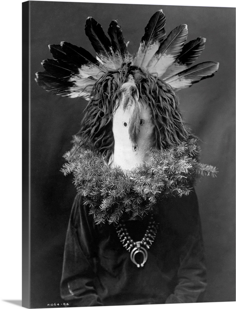 A photograph of a figure representing Haschogan, the Navajo house god, published in Volume I of The North American Indian ...