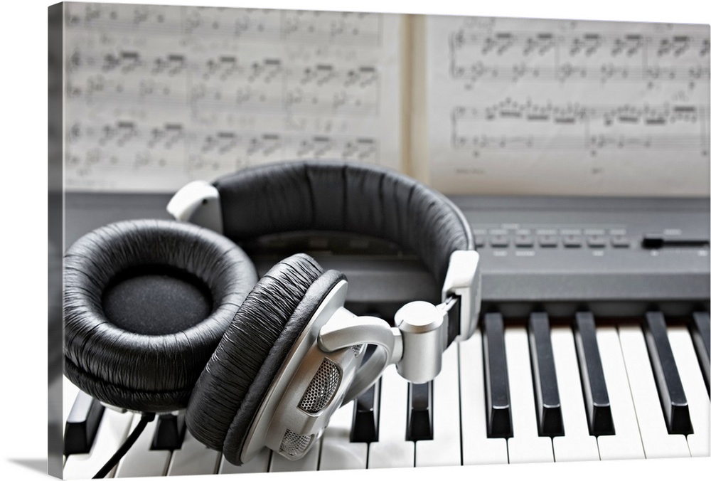 Headphones on electronic piano keyboard