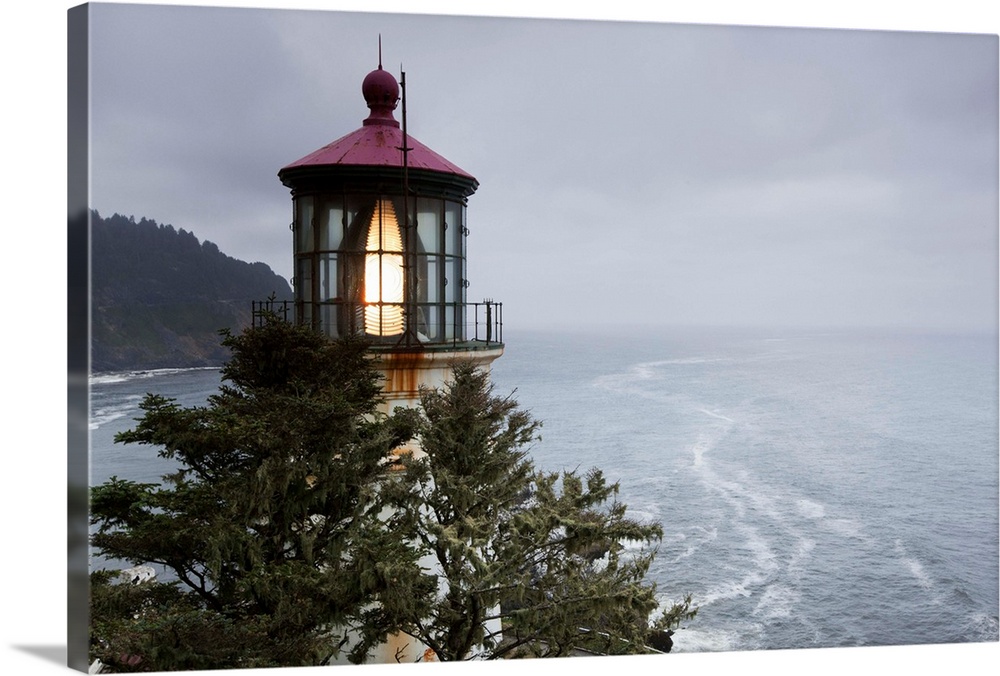 USA, Oregon, Florence, Summer fog along Pacific Ocean coastline and Heceta Head Lighthouse