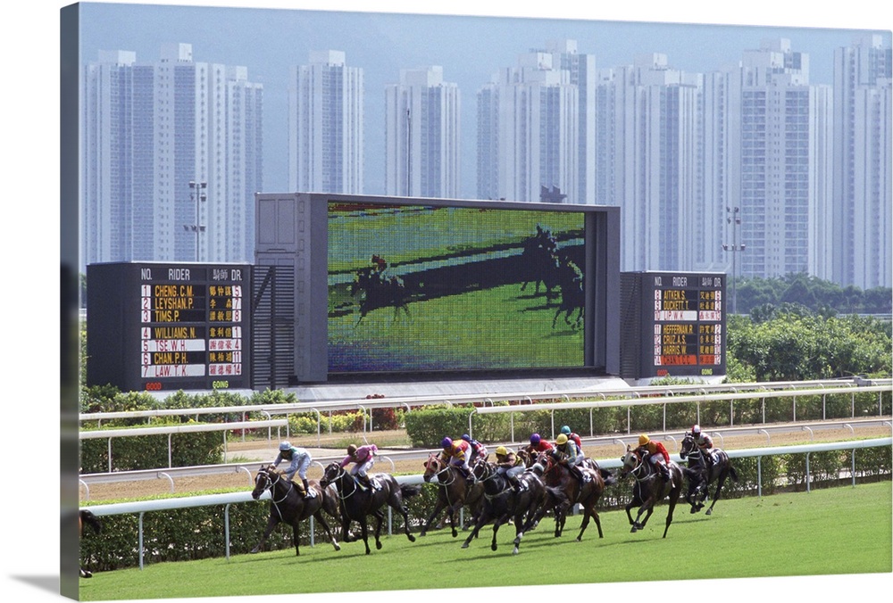 SHA TIN, HONG KONG - JANUARY 01:  Sha Tin Races, Hong Kong. A giant television screen is behind the race track.