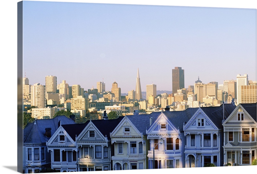 Houses with skyline cityscape behind it, Alamo Square, San Francisco