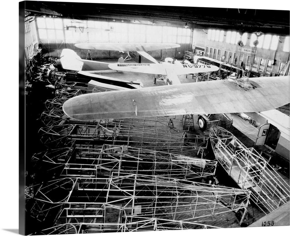 Monoplanes in various stages of assembly in the main hangar at the Fokker Aircraft Corporation manufacturing plant.