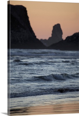 Intertidal rocks, soft waves at twilight