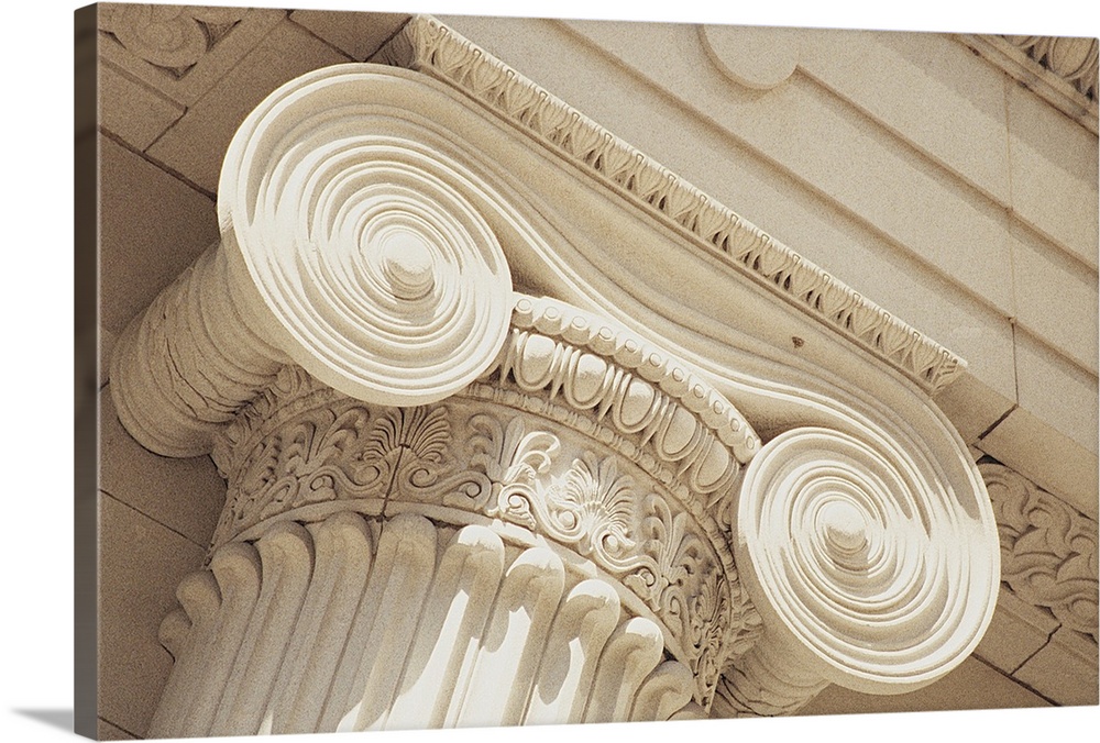 Big canvas print of the up close view of the details etched into a column.