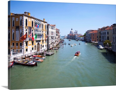 Italy, Venice, Boats on canal in city