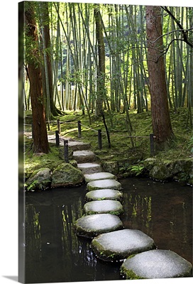 Japanese garden stone path over pond