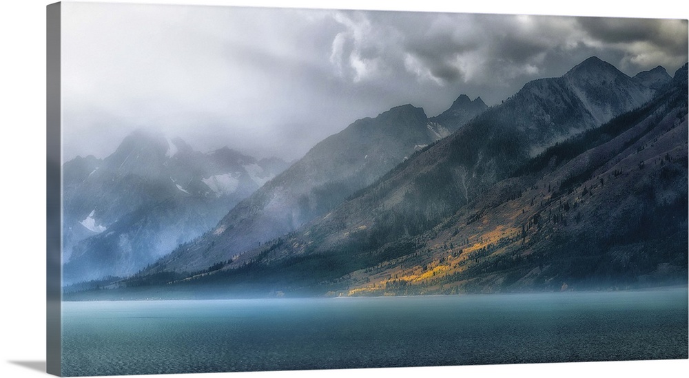 A beautiful fog laden morning on Jenny lake within the Grand Teton National Park. The fog would burn off quicly as the sun...