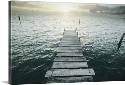 Jetty on sea, sunrise, Belize