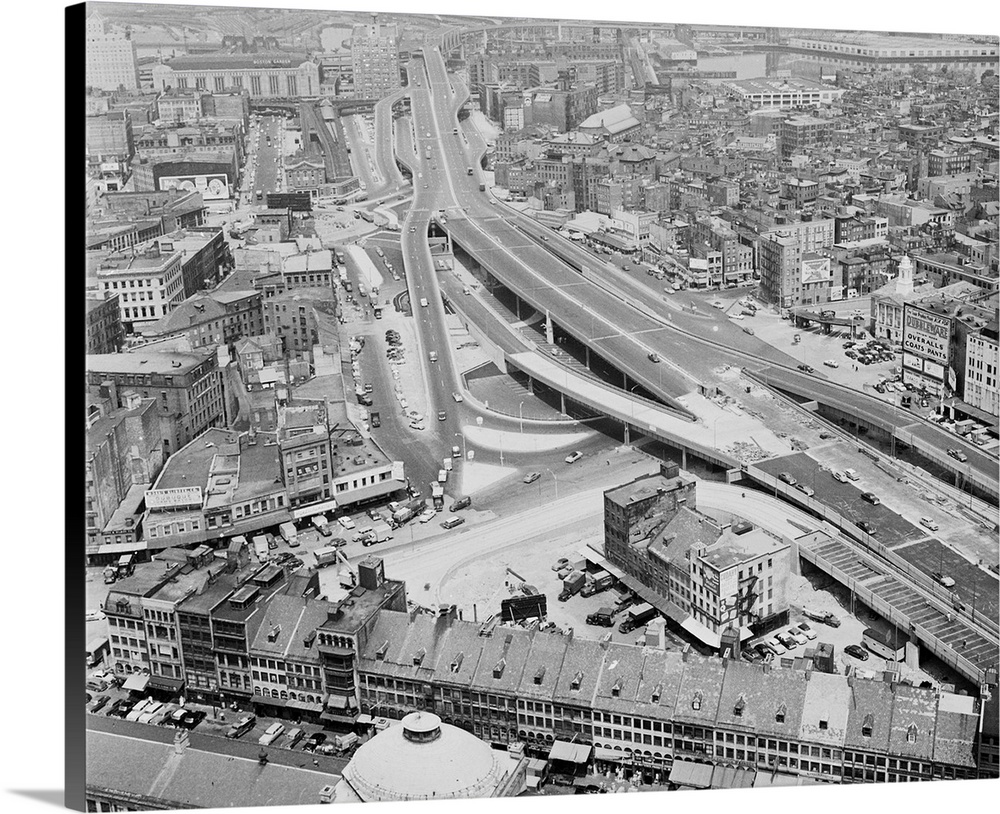 Traffic Lifeline. Boston, Mass.: Flowing through Boston, carrying traffic along at roof-top level through the city's marke...