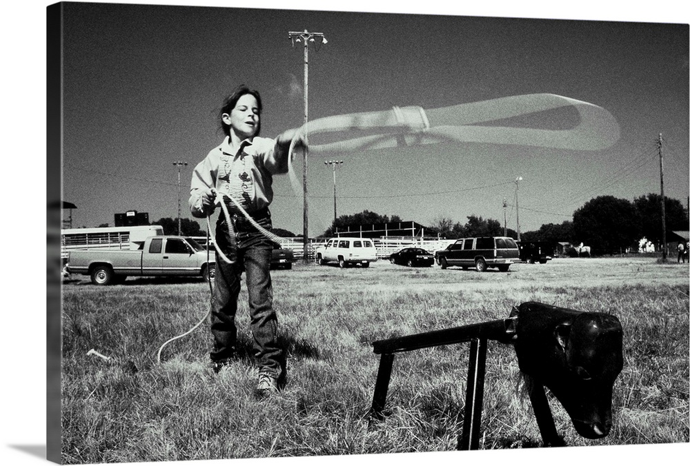 Junior Rodeo, girl(7-9)practising how to use lasso, Texas, USA  (B&W)