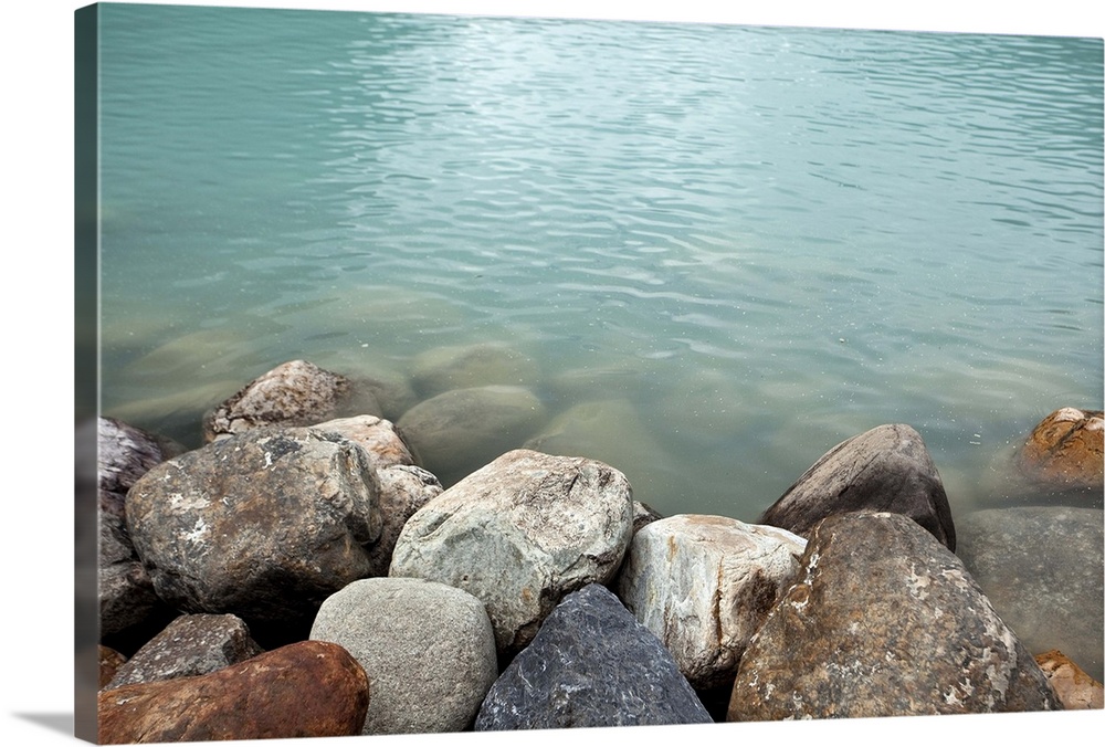 A different take to the typical photos of Lake Louise. I like the contrast between the rocks and the milky blue water