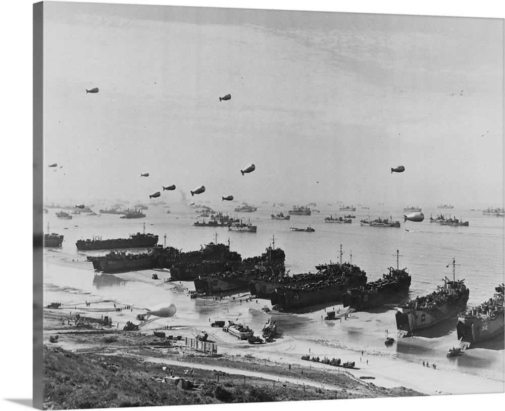 A panoramic view of Omaha beach during the Normandy Landings. Barrage balloons hover over assembled warships as the Allies...