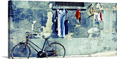 Laundry and a bike in Beijing's hutong