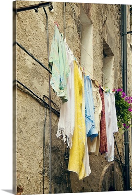 Laundry hanging from a window, Italy
