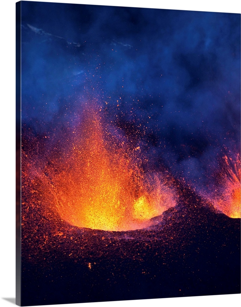 Lava fountains spurting during volcano eruption in Iceland at Fimmvorduhals, a ridge between Eyjafjallajokull glacier, and...