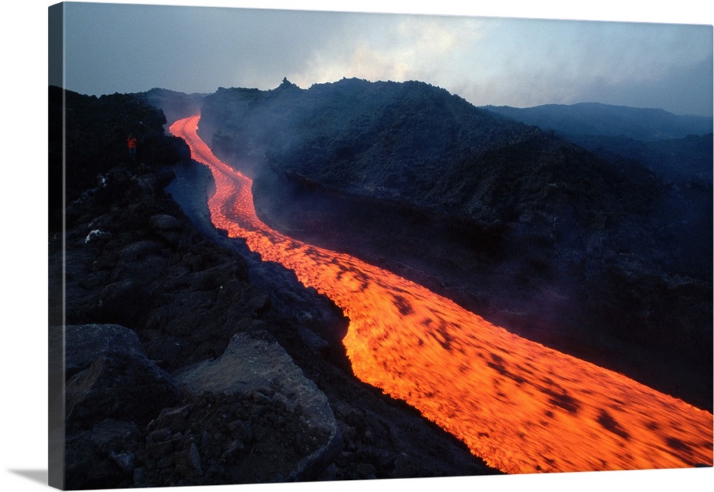 Lava flows in a stream from Mount Etna.