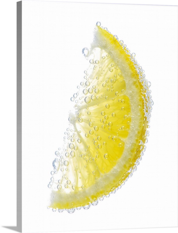 Lemon wedge fruit submerged in water and covered in bubbles Wall Art ...