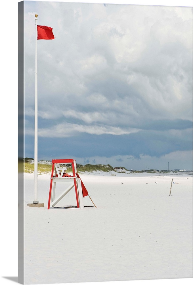 Lifeguard tower and flag on beach, Florida, US.