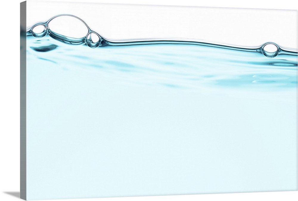 Level Clean Clear light  pale blue refreshing water drink with a couple of bubbles floating on the water surface tension o...