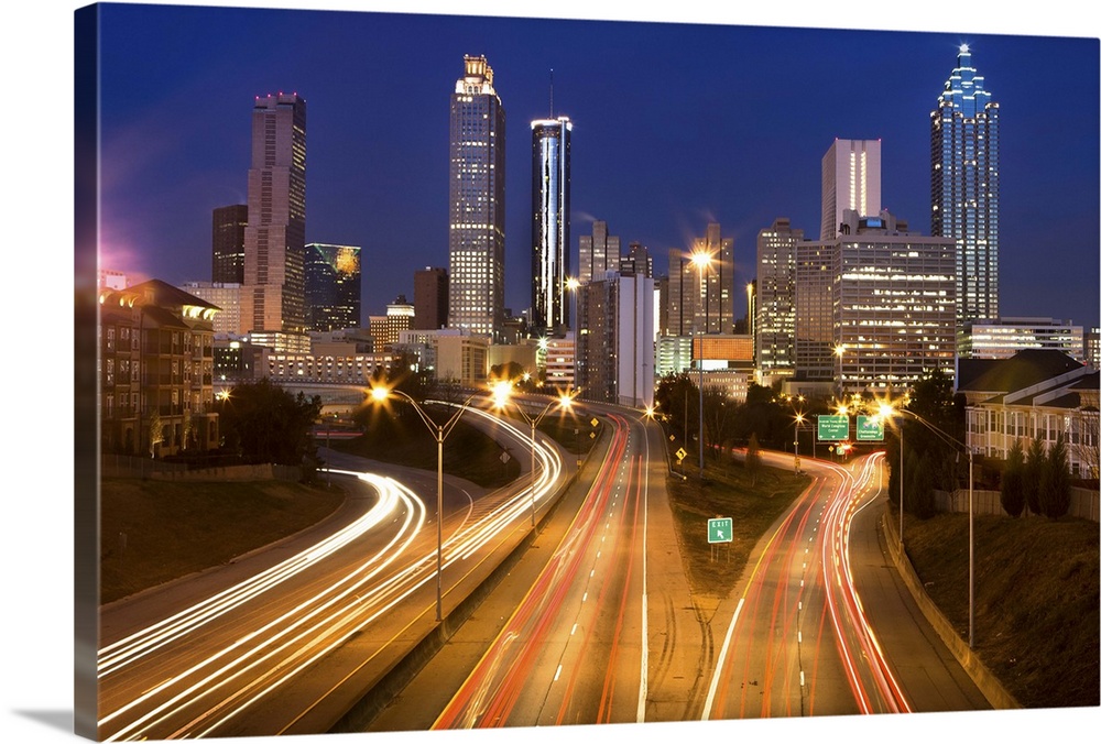 Atlanta city office buildings and highway traffic motion blur