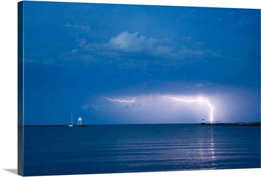 Lightning storm over a lighthouse, Lake Superior