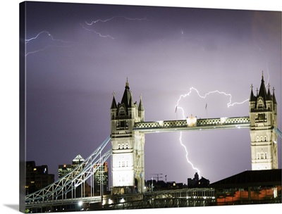 Lightning storm over the city of London with Tower Bridge in the foreground