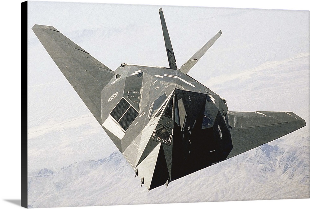 This F-117A Nighthawk is flying over Nellis Air Force Base, Nevada, USA.