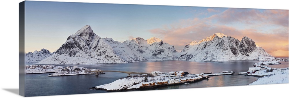 Panaromic view of Reina and Hamnoy at the end of Lofoten Islands during winter sunset. Two villages are made up of numerou...