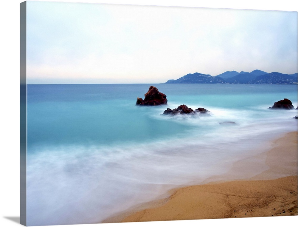Long exposure of blue sea in Cannes, French Riviera.