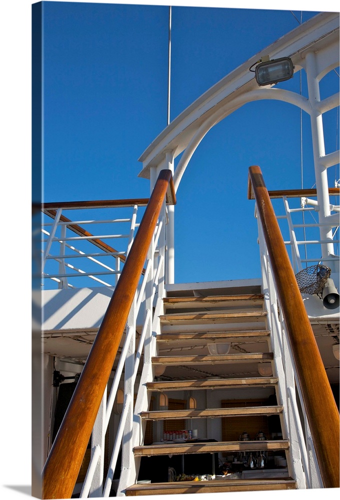 Looking up at staircase aboard Wind Spirit of Windstar Cruises