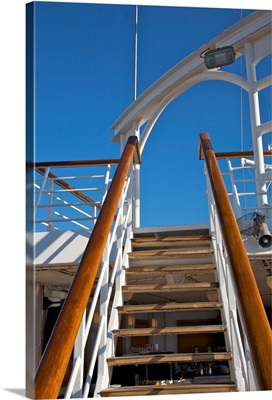 Looking up at staircase aboard Wind Spirit of Windstar Cruises