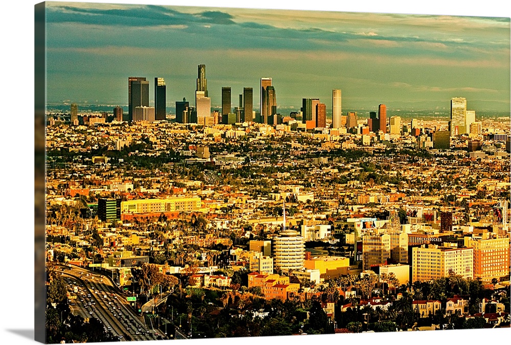 Los Angeles from above with Hollywood in foreground and LA skyline in distance.